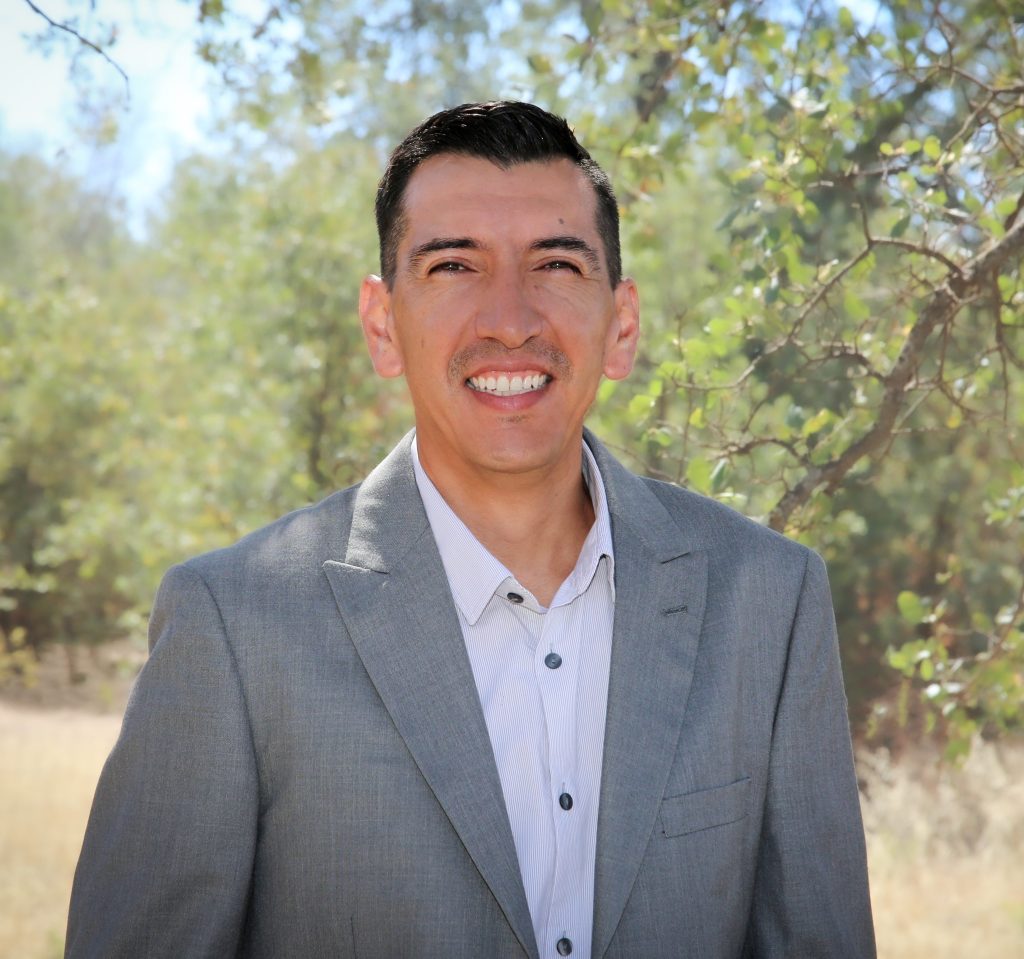 Smiling man in a forest