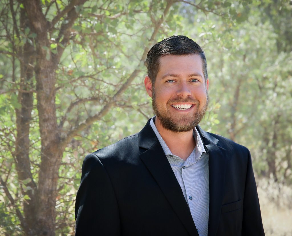Smiling man in a forest
