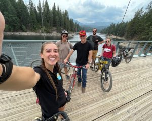 People on a bridge after a bike ride